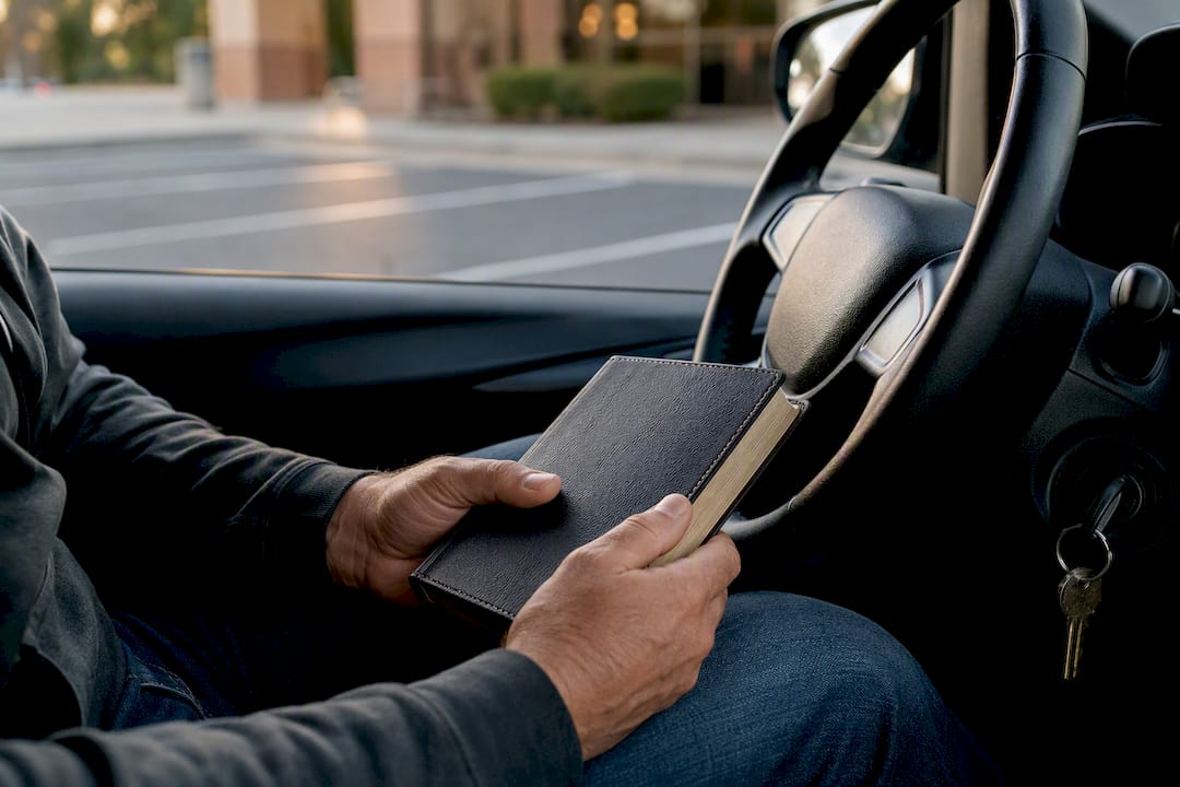 Man holding Bible during recovery craving